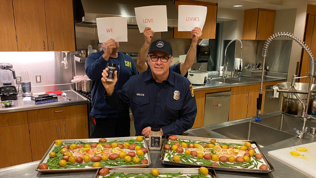 Firefighters cooking with Livia's Signature Seasoning