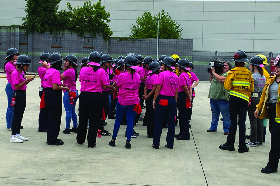 Girls gather at LAFD firefighter boot camp.