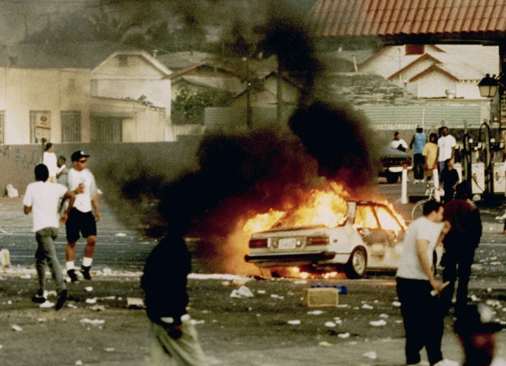 Car on fire during the 1992 L.A. Riots