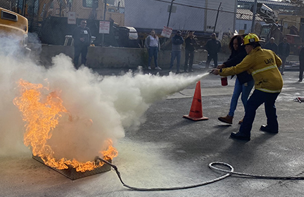 Extinguishing a fire during CERT Training