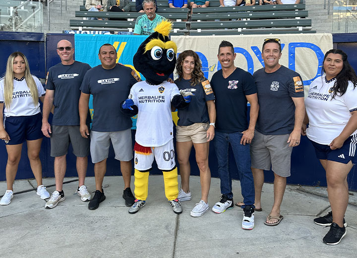 LA Galaxy mascot Cosmo with LAFD Firefighters