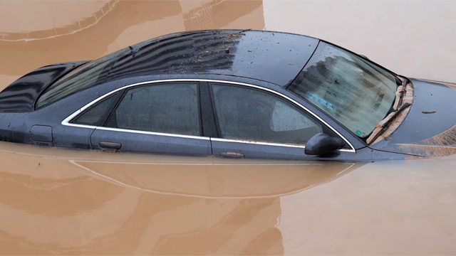 Car submerged in flood waters